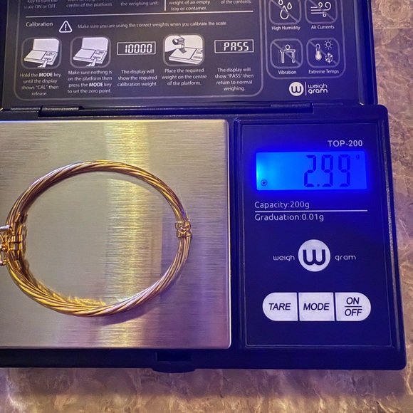 14K Yellow Gold Tubular Twisted Baby Bangle - Picture 1 of 7